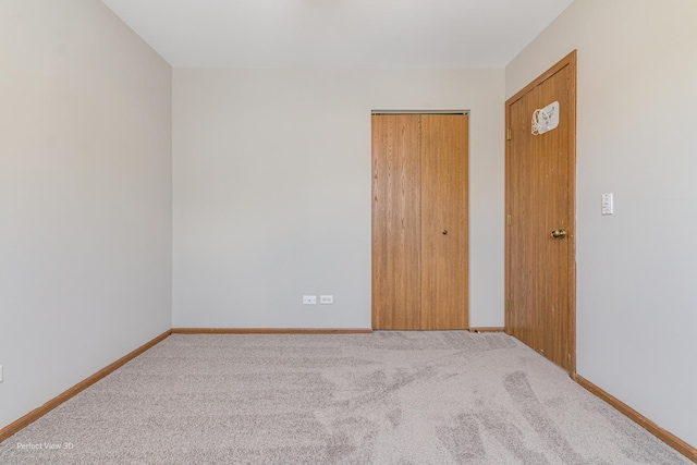 2675 Dorothy Dr, Aurora, IL 60504 - unfurnished bedroom with carpet floors, baseboards, and a closet