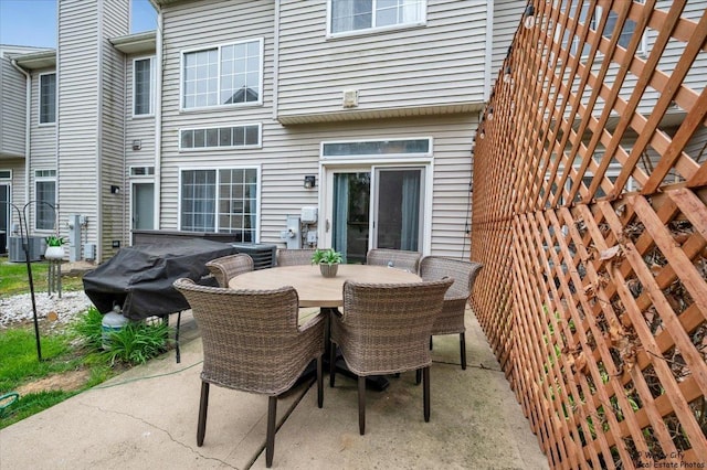 view of patio / terrace with grilling area and outdoor dining area