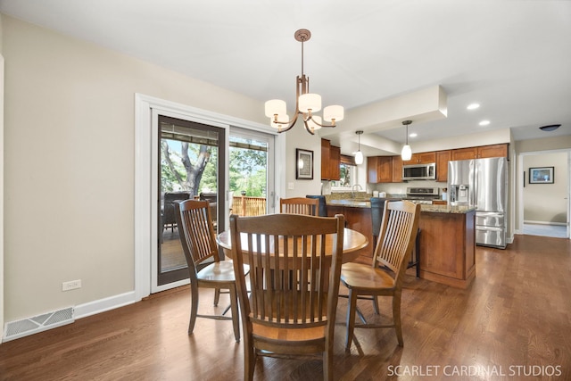 833 Shiloh Cir, Naperville, IL 60540 - dining area with dark wood finished floors, a chandelier, baseboards, and recessed lighting