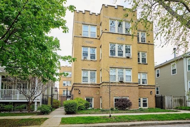 5060 N Claremont Ave Unit 2W, Chicago, IL 60625 - view of property with fence and cooling unit