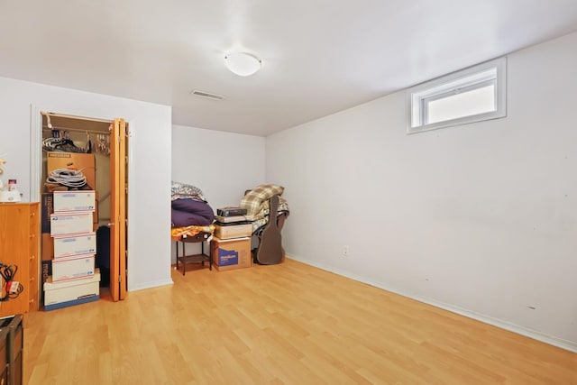 bedroom featuring light wood-type flooring