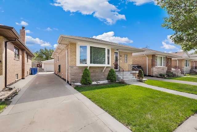 view of front of home with an outdoor structure, brick siding, a garage, and a front yard