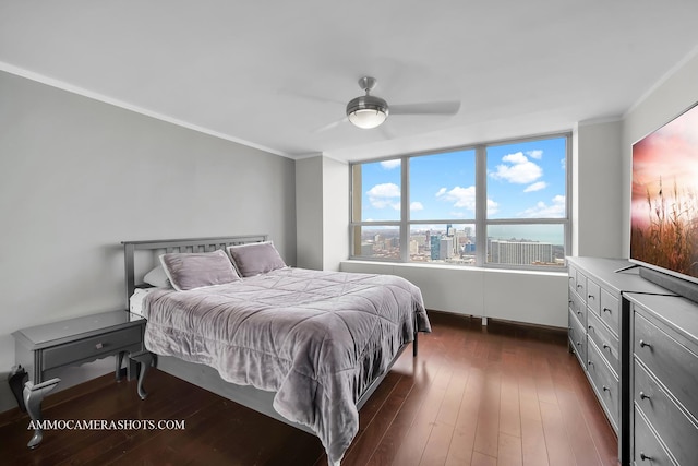 655 W Irving Park Rd Unit 3916, Chicago, IL 60613 - bedroom featuring crown molding, dark wood finished floors, and a ceiling fan