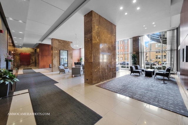 655 W Irving Park Rd Unit 3916, Chicago, IL 60613 - common area featuring expansive windows, a high ceiling, and recessed lighting