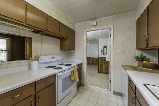 6305 247th Ave, Paddock Lake, WI 53168 - kitchen with white appliances, light countertops, and light floors