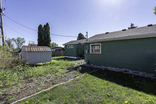 6305 247th Ave, Paddock Lake, WI 53168 - view of yard with a storage shed and an outdoor structure