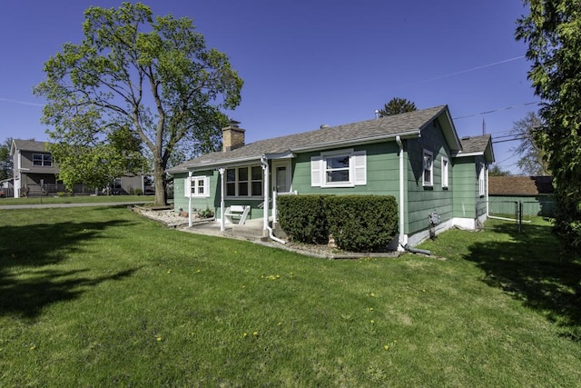 6305 247th Ave, Paddock Lake, WI 53168 - back of property featuring a chimney, a patio area, and a shingled roof