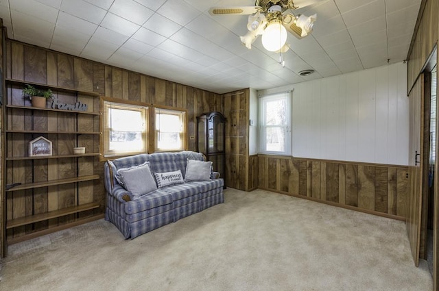 6305 247th Ave, Paddock Lake, WI 53168 - sitting room with wooden walls, a ceiling fan, and carpet flooring