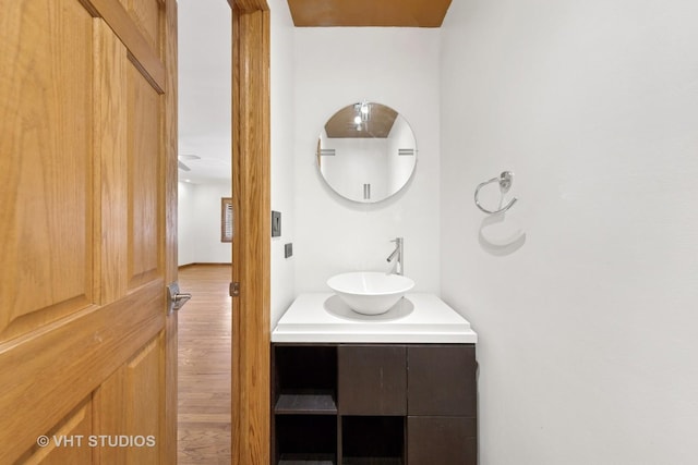 3913 N Kedvale Ave Unit A, Chicago, IL 60641 - bathroom with wood finished floors and vanity
