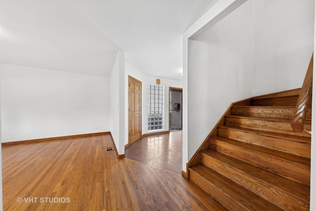 3913 N Kedvale Ave Unit A, Chicago, IL 60641 - stairs featuring baseboards and wood finished floors