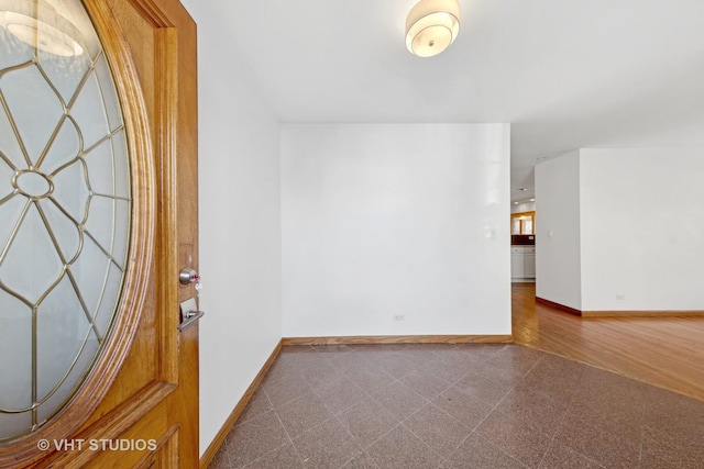 3913 N Kedvale Ave Unit A, Chicago, IL 60641 - foyer entrance with baseboards and granite floors