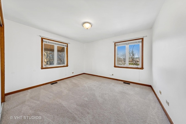 3913 N Kedvale Ave Unit A, Chicago, IL 60641 - spare room featuring baseboards and carpet floors