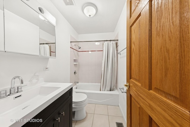 3913 N Kedvale Ave Unit A, Chicago, IL 60641 - full bath featuring tile patterned floors, toilet, shower / tub combo with curtain, and vanity