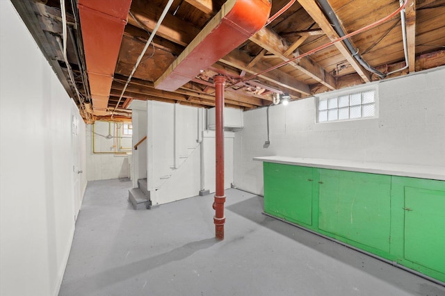 basement featuring stairway