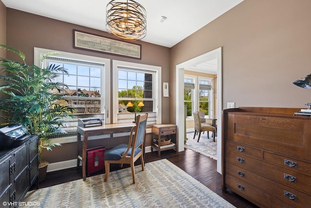 149 W Kennedy Ln Unit 208, Hinsdale, IL 60521 - office area featuring wood finished floors, baseboards, and a chandelier