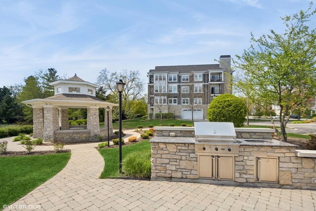 149 W Kennedy Ln Unit 208, Hinsdale, IL 60521 - view of property's community featuring area for grilling and a gazebo
