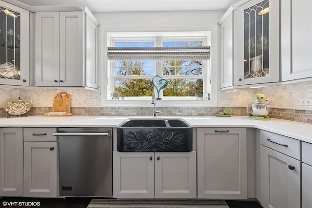 149 W Kennedy Ln Unit 208, Hinsdale, IL 60521 - kitchen with dishwasher, a sink, gray cabinetry, decorative backsplash, and light countertops