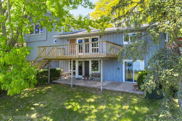 907 Division St, Barrington, IL 60010 - back of house featuring stairway, a patio, a lawn, and a wooden deck