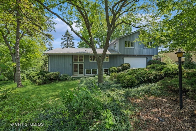 907 Division St, Barrington, IL 60010 - back of property featuring an attached garage