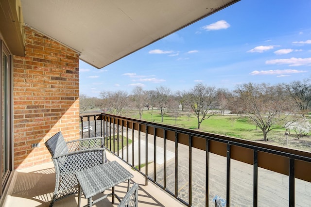 balcony with view of scattered trees