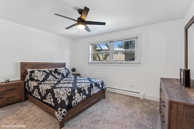 1009 8th Ave Unit 15-4, La Grange, IL 60525 - bedroom with a baseboard radiator, carpet, ceiling fan, and baseboards