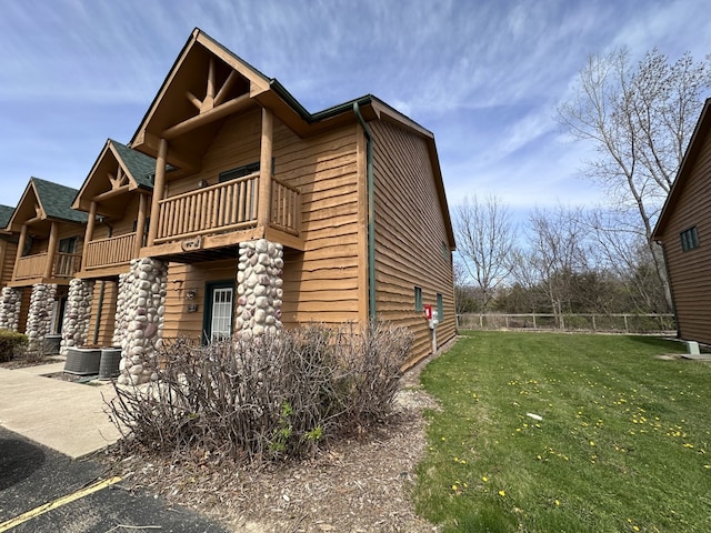 2643 N Il Route 178th Hwy Unit J-4, Utica, IL 61373 - view of side of property with a balcony and central AC