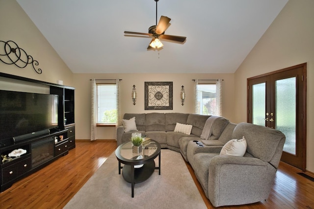 1729 Hidden Oaks Ct, Plainfield, IL 60586 - living room featuring light wood-type flooring, plenty of natural light, a ceiling fan, and high vaulted ceiling