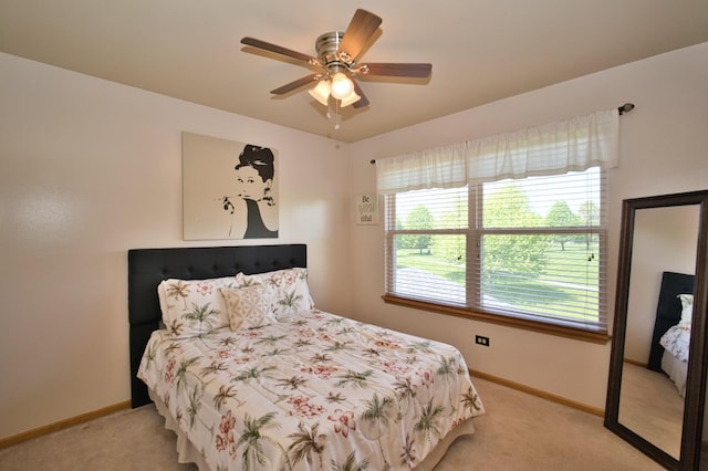 1729 Hidden Oaks Ct, Plainfield, IL 60586 - bedroom with light carpet, baseboards, and ceiling fan