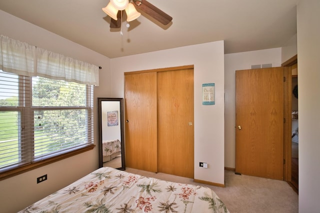 1729 Hidden Oaks Ct, Plainfield, IL 60586 - bedroom featuring a closet, carpet flooring, and a ceiling fan