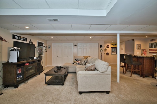 1729 Hidden Oaks Ct, Plainfield, IL 60586 - carpeted living room with a bar, recessed lighting, and baseboards