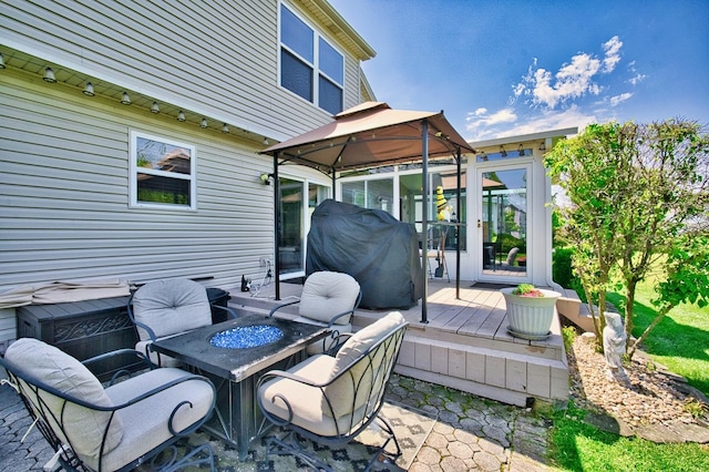 1729 Hidden Oaks Ct, Plainfield, IL 60586 - view of patio / terrace featuring a gazebo, grilling area, a wooden deck, and a sunroom