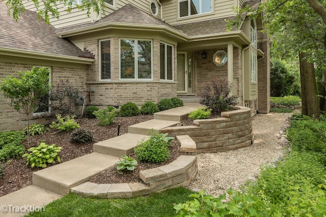2325 Durand Dr, Downers Grove, IL 60515 - property entrance featuring brick siding and roof with shingles