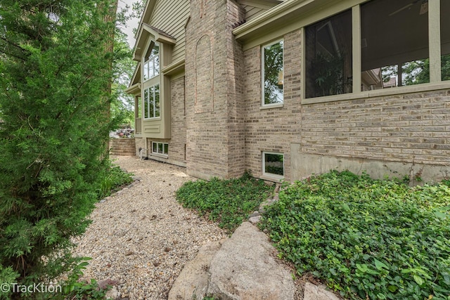 2325 Durand Dr, Downers Grove, IL 60515 - view of side of property featuring brick siding and a sunroom