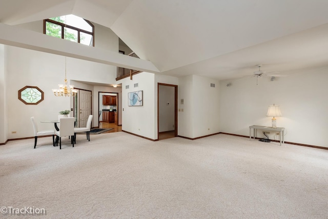 2325 Durand Dr, Downers Grove, IL 60515 - unfurnished living room featuring light colored carpet, high vaulted ceiling, a chandelier, and ceiling fan