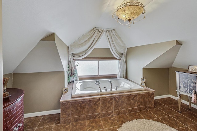 2742 N 76th Ct, Elmwood Park, IL 60707 - full bathroom featuring lofted ceiling, a bath, baseboards, and tile patterned flooring