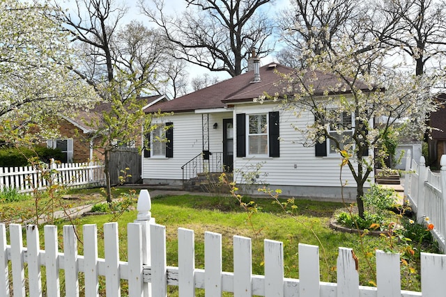 313 N Jackson St, Waukegan, IL 60085 - view of front of property with a chimney and a shingled roof