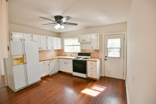 313 N Jackson St, Waukegan, IL 60085 - kitchen featuring white appliances, ceiling fan, light countertops, a sink, and tasteful backsplash