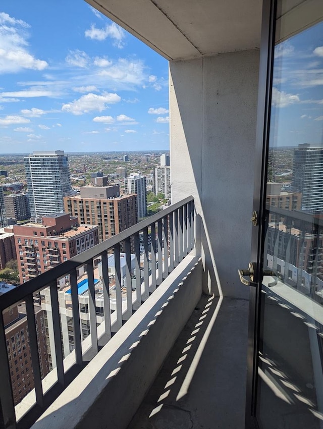 balcony featuring a city view
