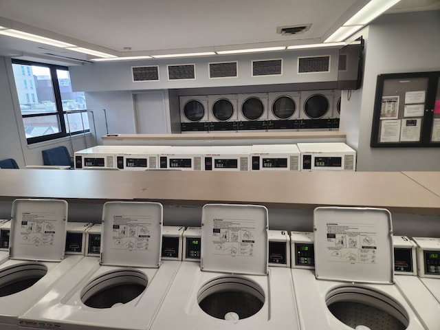 shared laundry room with washer / dryer