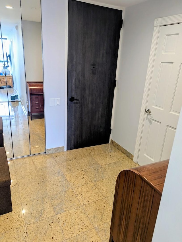 corridor with baseboards