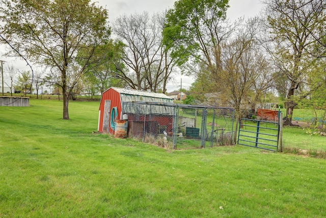 view of poultry coop with a lawn