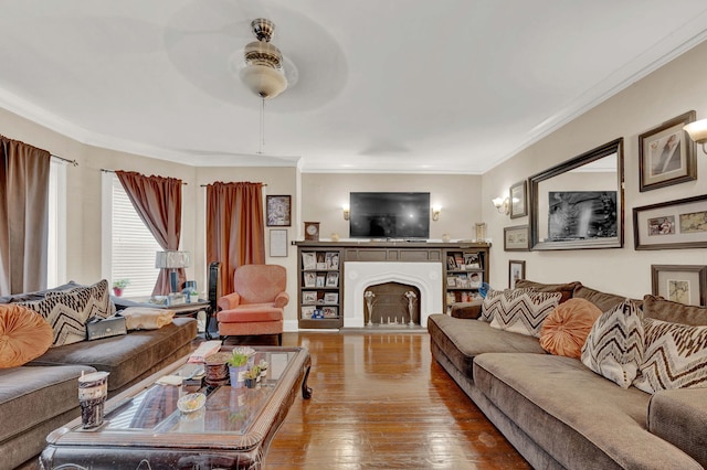 7800 S Aberdeen St, Chicago, IL 60620 - living room featuring a fireplace with raised hearth, hardwood / wood-style floors, and ornamental molding