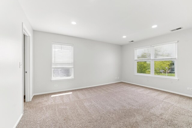 10616 Rushmore Ln, Huntley, IL 60142 - carpeted spare room featuring baseboards and recessed lighting