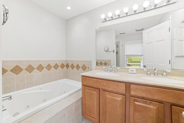 10616 Rushmore Ln, Huntley, IL 60142 - bathroom featuring a whirlpool tub and double vanity
