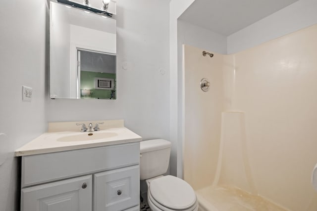9935 El Cameno Real Dr Unit 3D, Orland Park, IL 60462 - bathroom with a stall shower, toilet, and vanity
