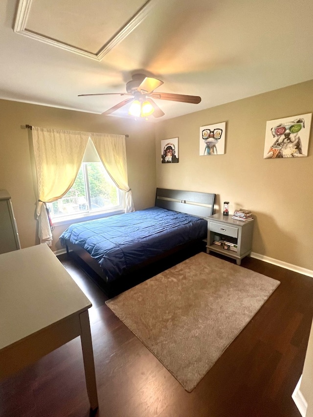 1932 Royal Ln, Aurora, IL 60503 - bedroom featuring dark wood-style floors, baseboards, and a ceiling fan