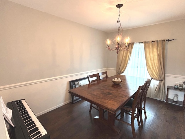 1932 Royal Ln, Aurora, IL 60503 - dining area featuring a chandelier, wood finished floors, and baseboards