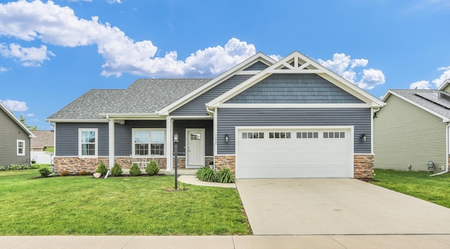 1608 E Horizon Ln, Urbana, IL 61802 - craftsman-style house with a front yard, a garage, stone siding, and concrete driveway
