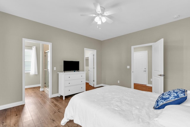 1608 E Horizon Ln, Urbana, IL 61802 - bedroom with wood finished floors, baseboards, and ceiling fan