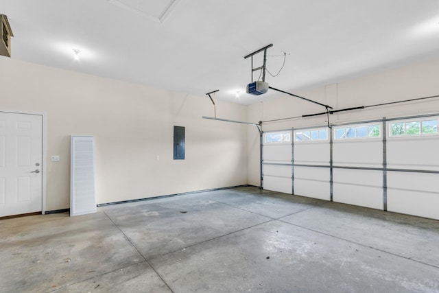 1608 E Horizon Ln, Urbana, IL 61802 - garage featuring a garage door opener and electric panel